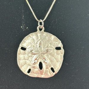 Sanddollar Pendent On A Sterling Silver Chain